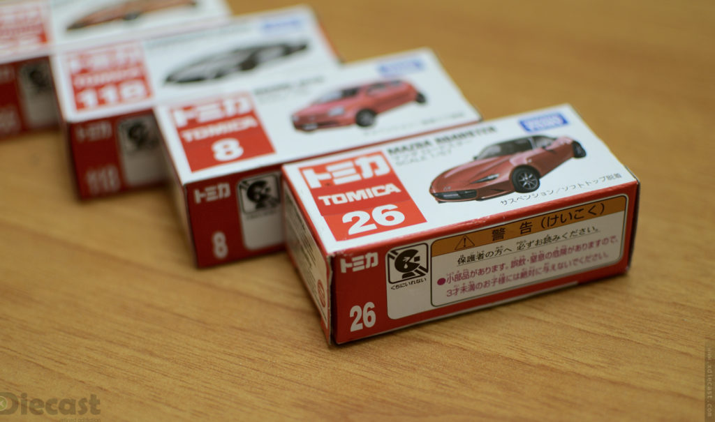 Four Tomica Mini Diecast Models – Unboxed